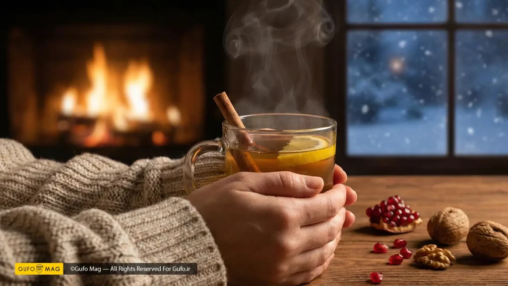 ماگ دمنوش زمستانی را در مقابل شومینه روشن